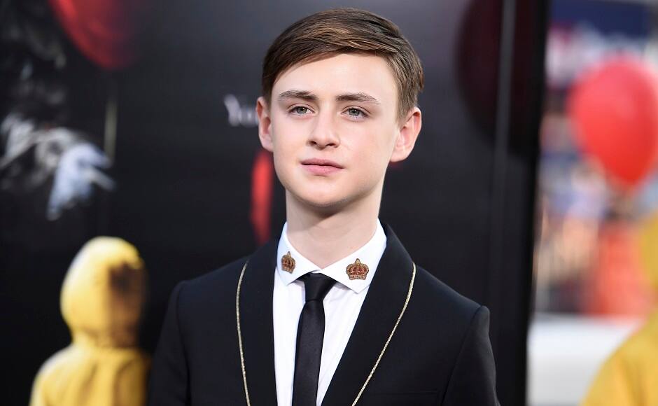 Jaeden Lieberher, who plays the character of Bill D0enbrough in the adaptation, attends the premiere. Image from AP.